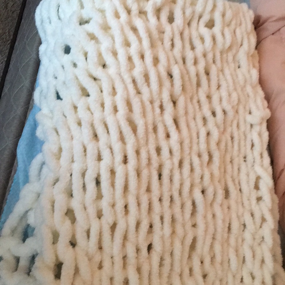 White fluffy hand knit blanket